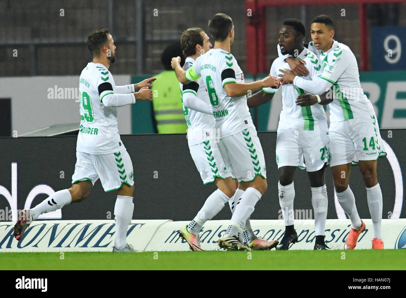 Karlsruhe, Germany. 2nd Dec, 2016. Khaled Narey (R) of Fuerth cheers over the 0-1 score with Mathis Bolly and more of his teammates during the German 2. Bundesliga soccer match between Karlsruher SC and SpVgg Greuther Fuerth at the Wildparkstadium in Karlsruhe, Germany, 2 December 2016. (EMBARGO CONDITIONS - ATTENTION: Due to the accreditation guidelines, the DFL only permits the publication and utilisation of up to 15 pictures per match on the internet and in online media during the match.) Photo: Uwe Anspach/dpa/Alamy Live News Stock Photo