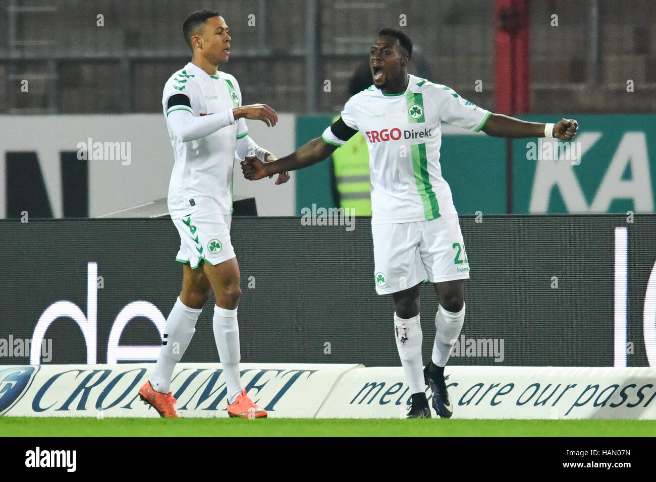Karlsruhe, Germany. 2nd Dec, 2016. Khaled Narey (R) of Fuerth cheers over the 0-1 score with Mathis Bolly during the German 2. Bundesliga soccer match between Karlsruher SC and SpVgg Greuther Fuerth at the Wildparkstadium in Karlsruhe, Germany, 2 December 2016. (EMBARGO CONDITIONS - ATTENTION: Due to the accreditation guidelines, the DFL only permits the publication and utilisation of up to 15 pictures per match on the internet and in online media during the match.) Photo: Uwe Anspach/dpa/Alamy Live News Stock Photo