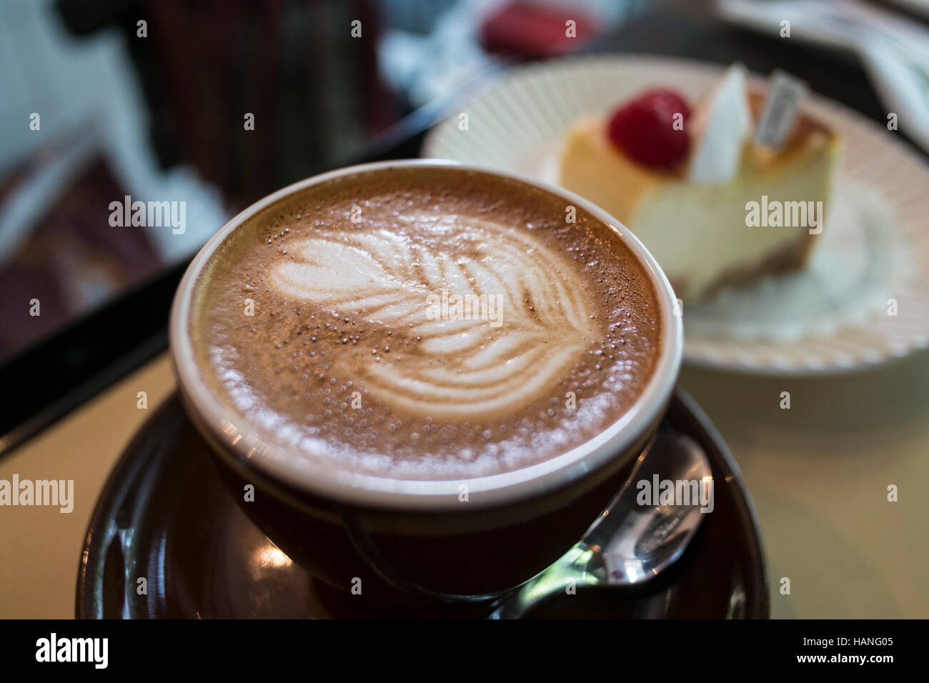 fresh hot cup of coffe with latte art  Shanghai Stock Photo