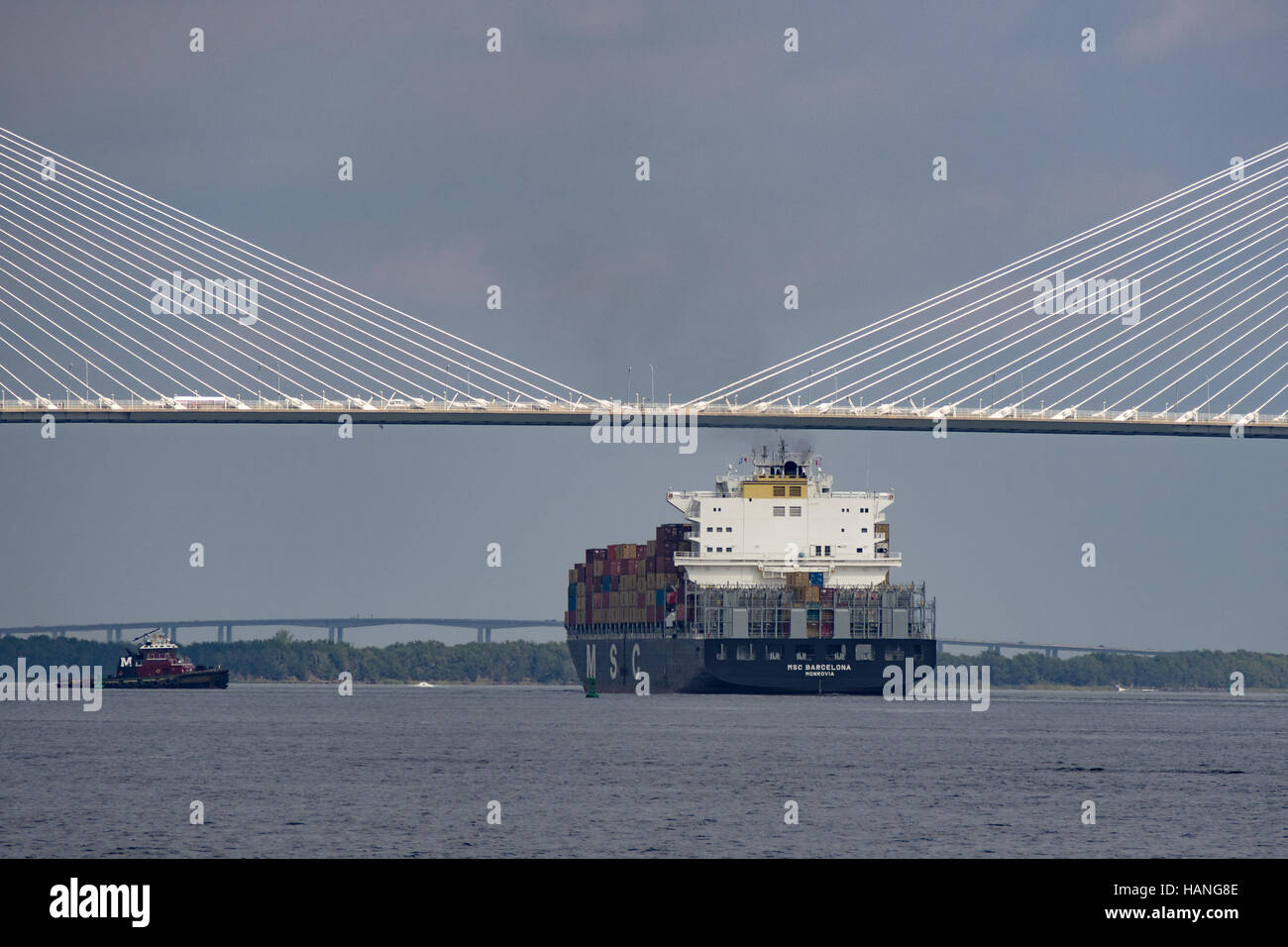 Container ship heads under the Arthur Ravenel Jr. Bridge Stock Photo