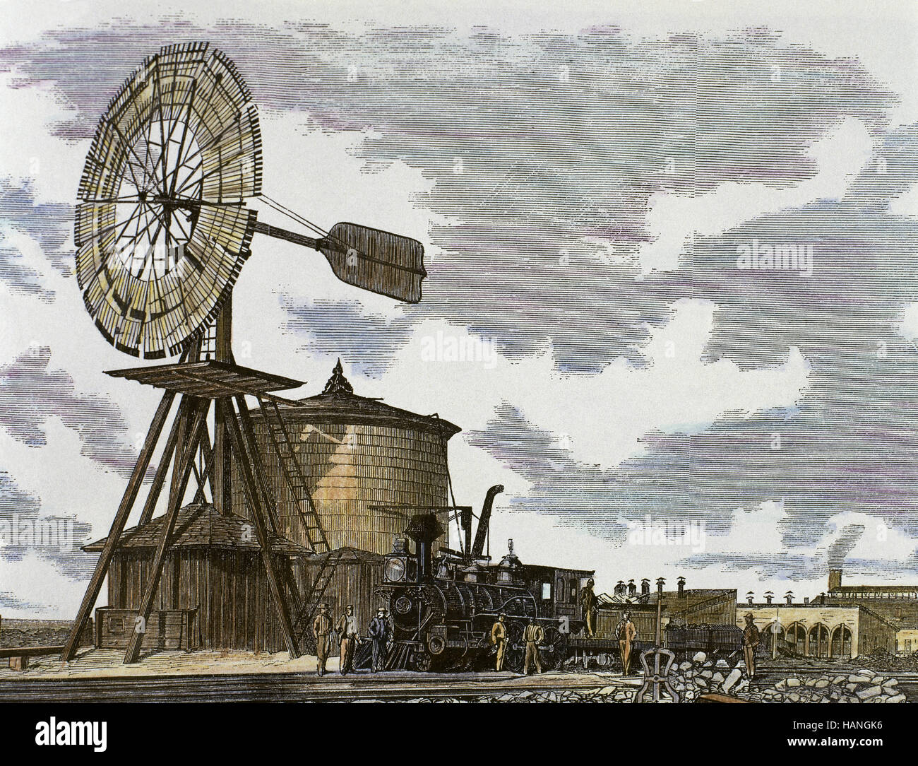 American West. 19th century. Laramie, Wyoming. Union Pacific Railroad. Railroad station with a large water tank and a windmill to fill up the locomotive. Colored engraving, 1869. Stock Photo