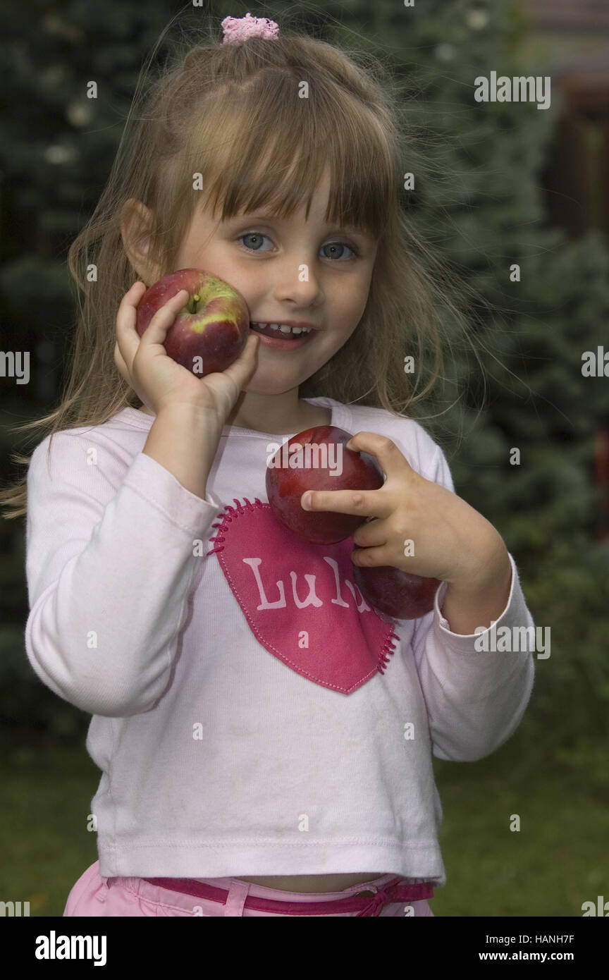 Girl with apple Stock Photo Alamy