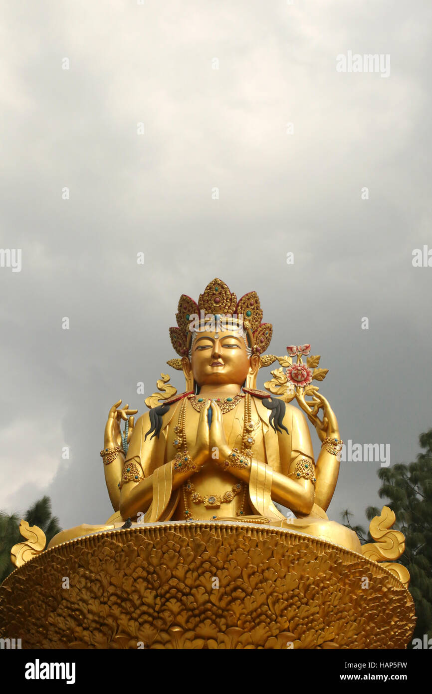 Golden statue of Buddha, Swayambhu Nath temple, Kathmandu, Nepal Stock Photo