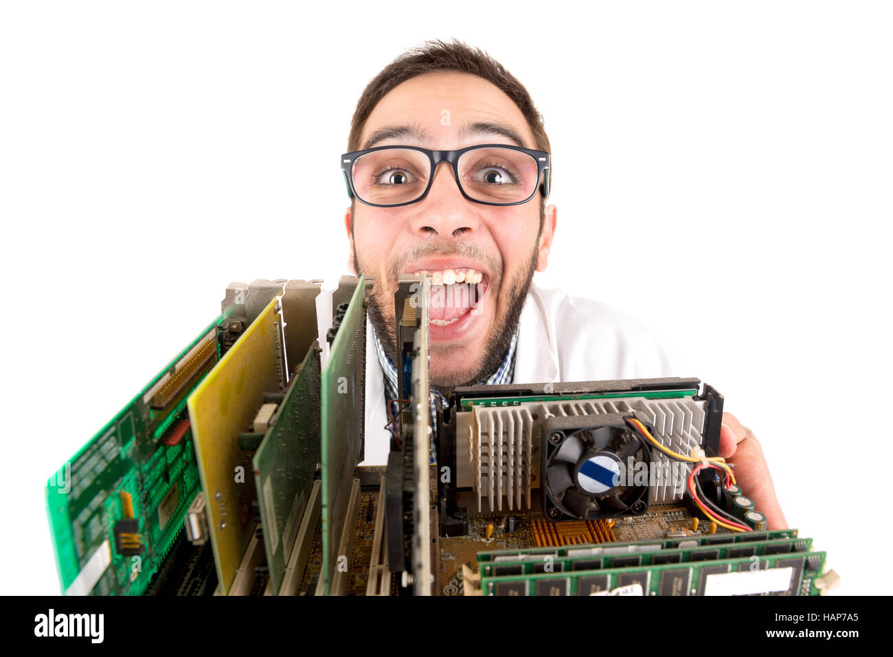 Nerd engineer posing with computer components isolated in a white background Stock Photo