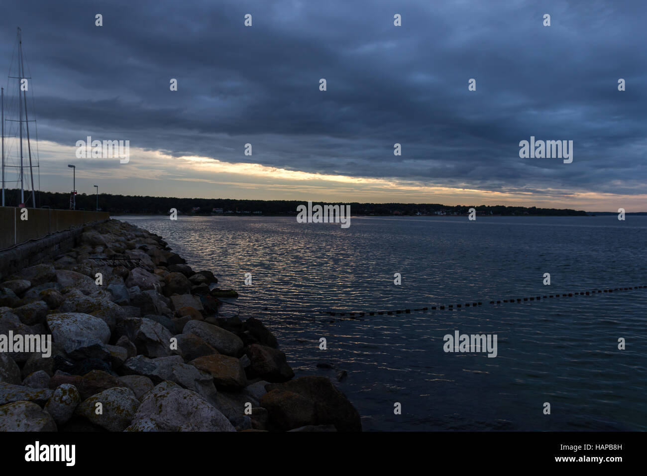 A harbor and fishing net at twilight Stock Photo
