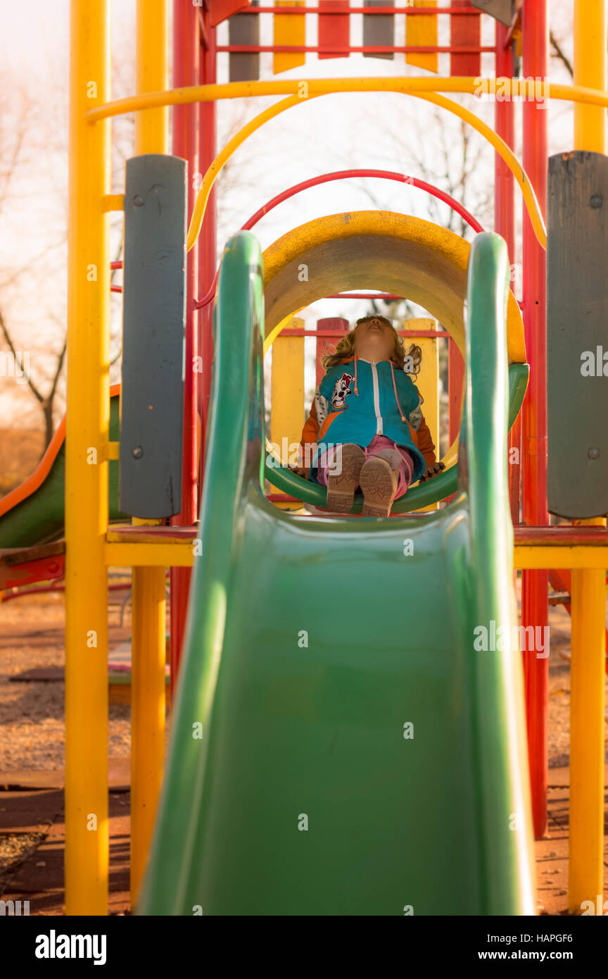 Little Girl Playing At Playground Stock Photo - Alamy