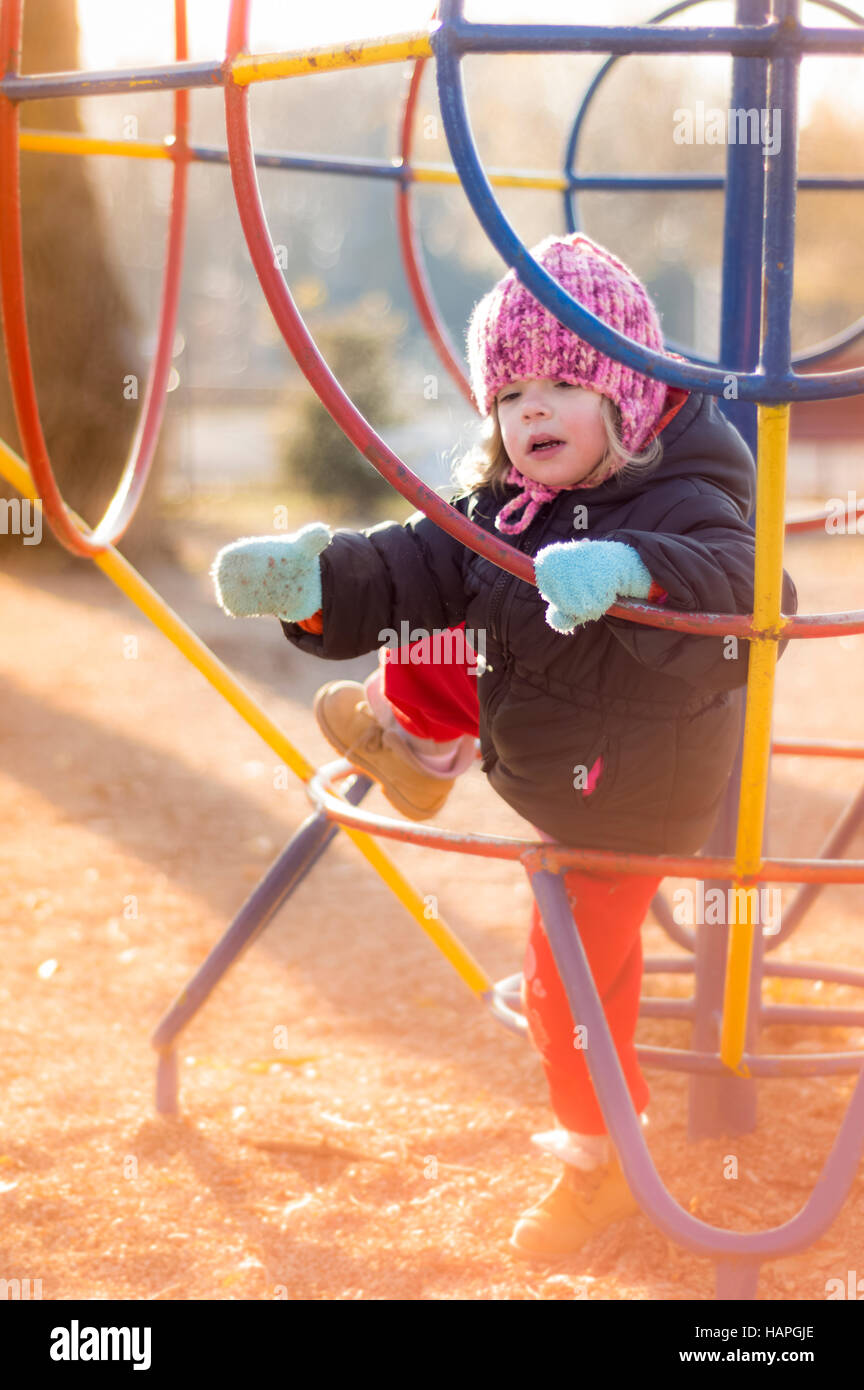 Little Girl Playing At Playground Stock Photo - Alamy