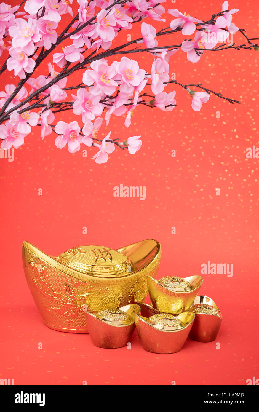 Chinese gold ingot and abacus with Chinese calligraphy mean symbols of