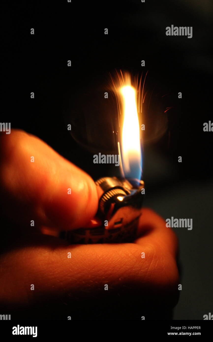 Lighter Caught In Motion Stock Photo
