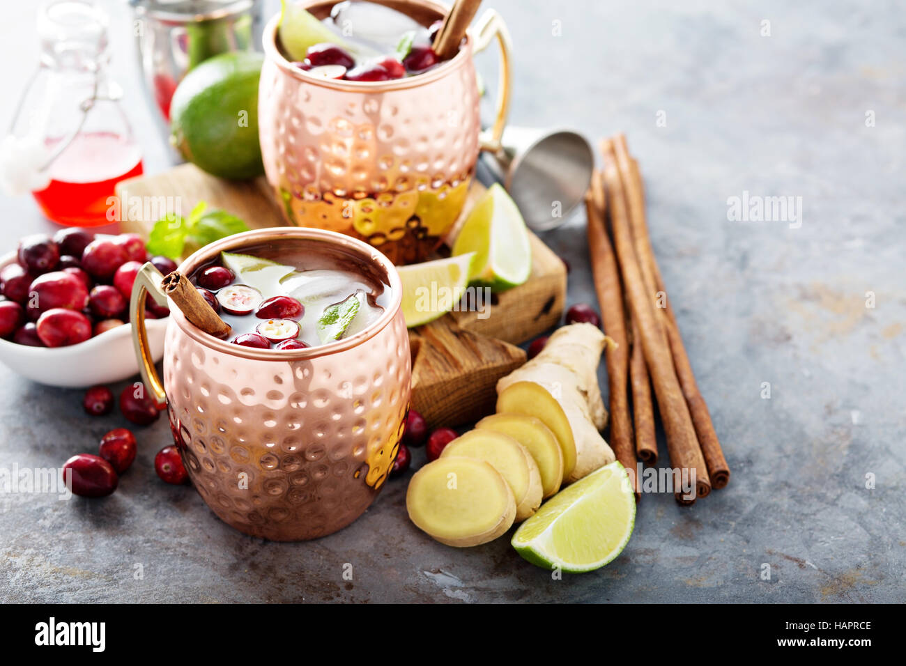 Moscow mule cocktail with ginger and cranberry Stock Photo