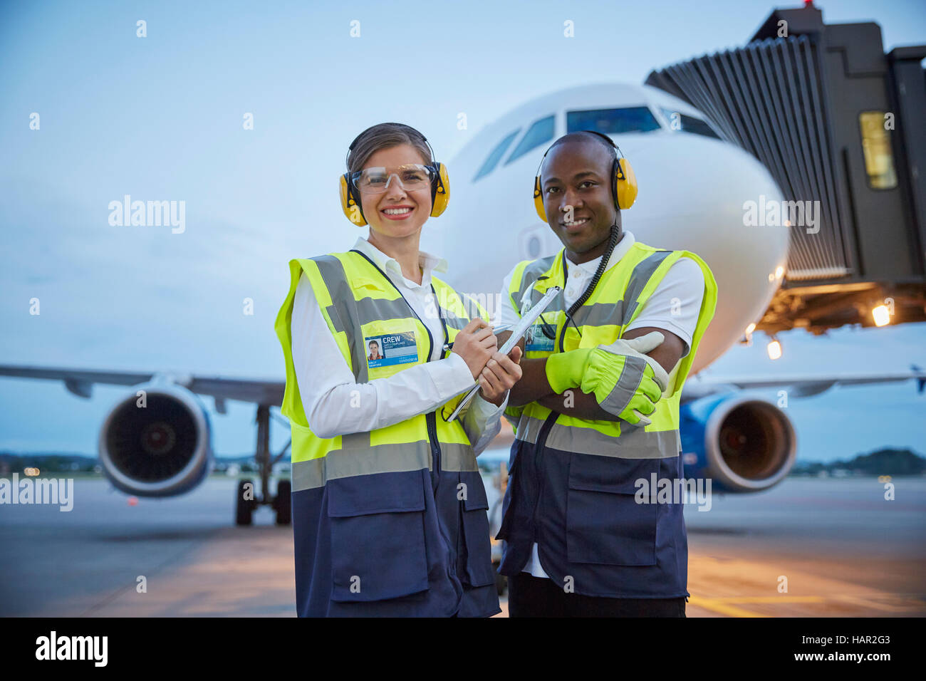 Portrait confident air traffic control ground crew workers near