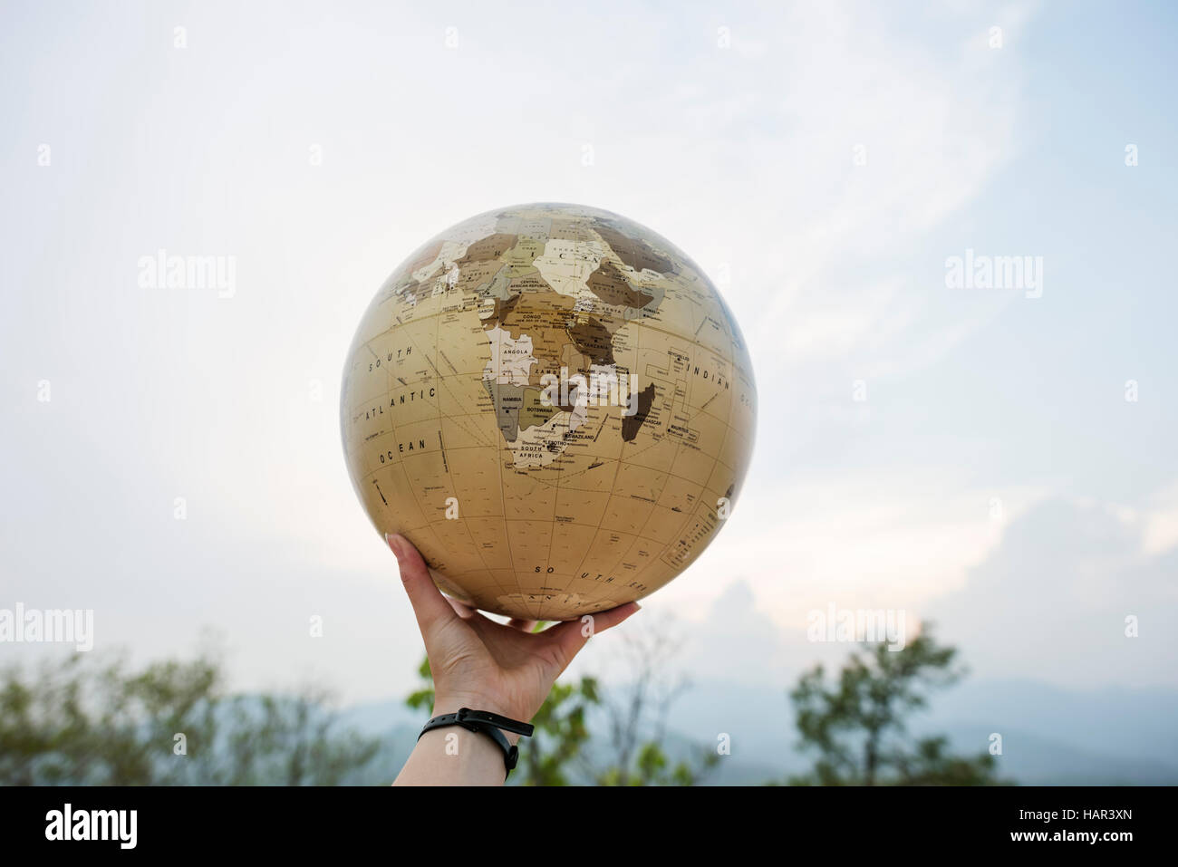 Hand Holding Globe World Location Concept Stock Photo