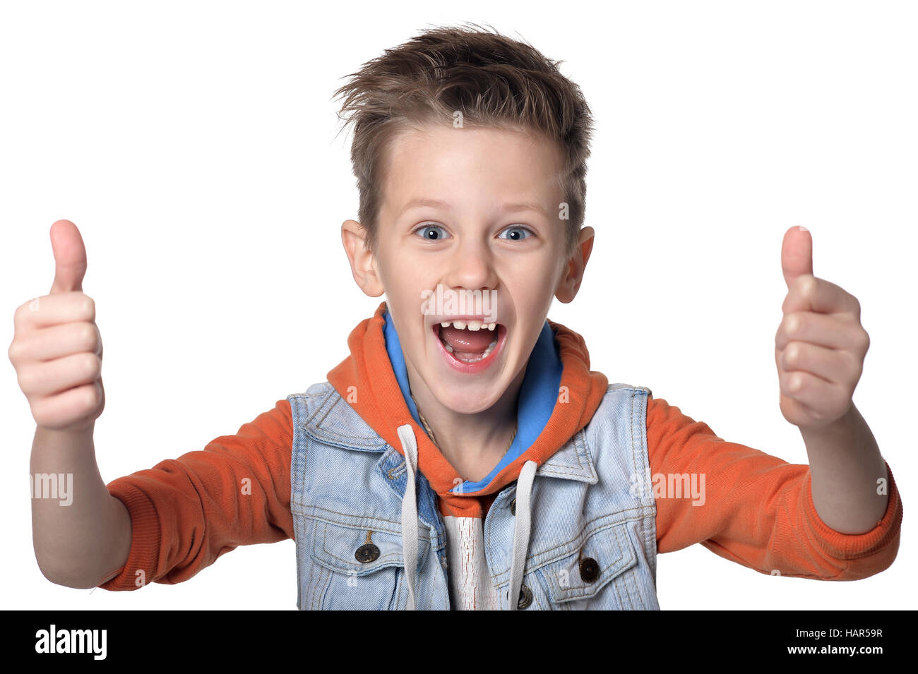 Boy shows thumbs up Stock Photo - Alamy