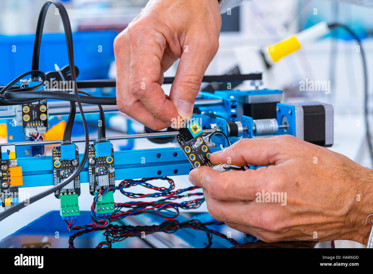 Hand adjusting circuit hi-res stock photography and images - Alamy