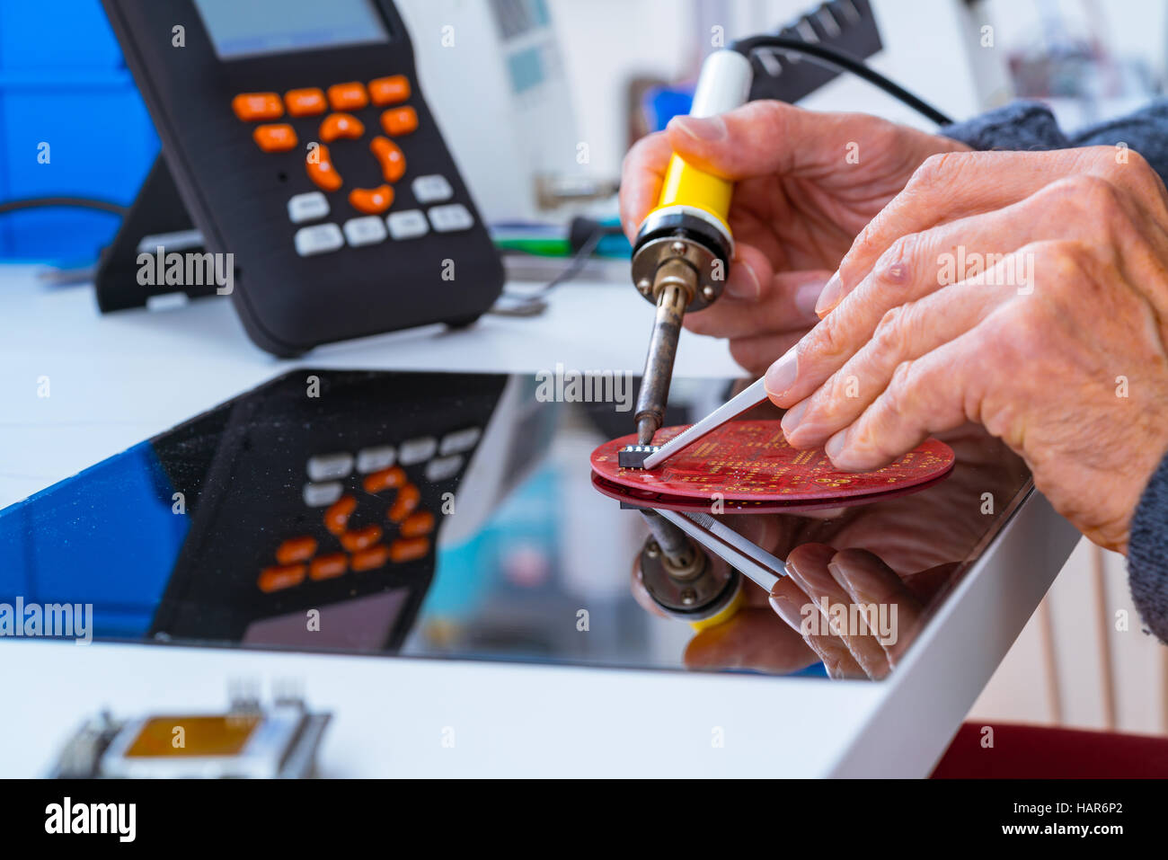 Adjusting an industrial robot with a CNC computer control Stock Photo ...
