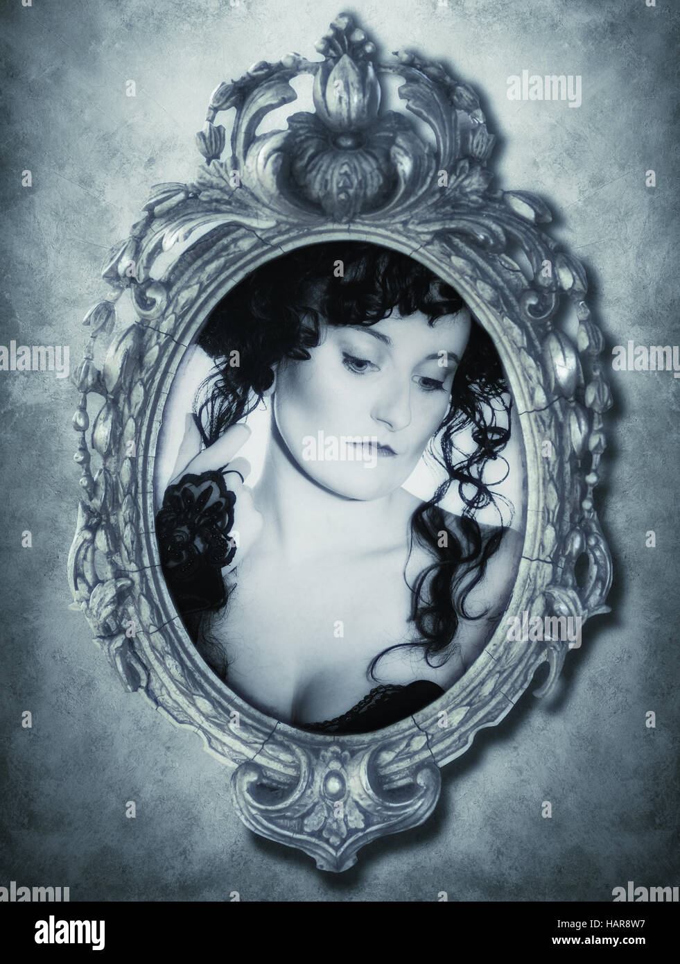 Portrait of gothic woman in framed mirror - blue tone Stock Photo - Alamy