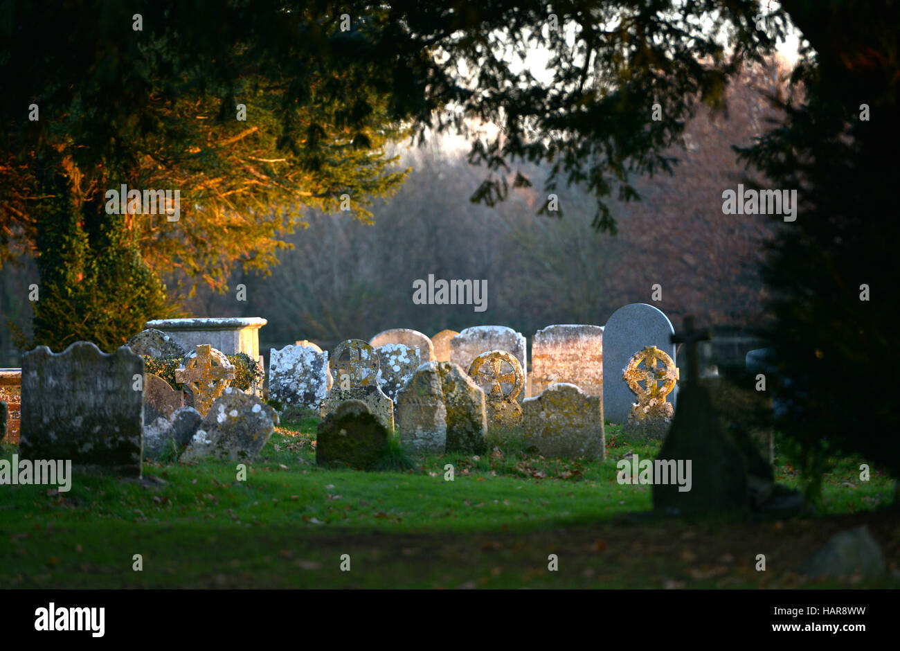 Graves in a country churchyard Stock Photo