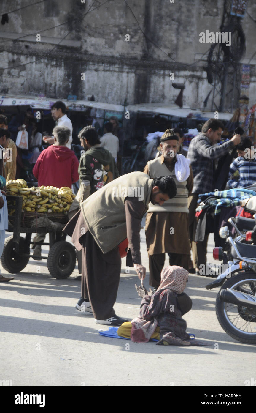 Rawalpindi, Pakistan. 02nd Dec, 2016. Disable menis begging for help in