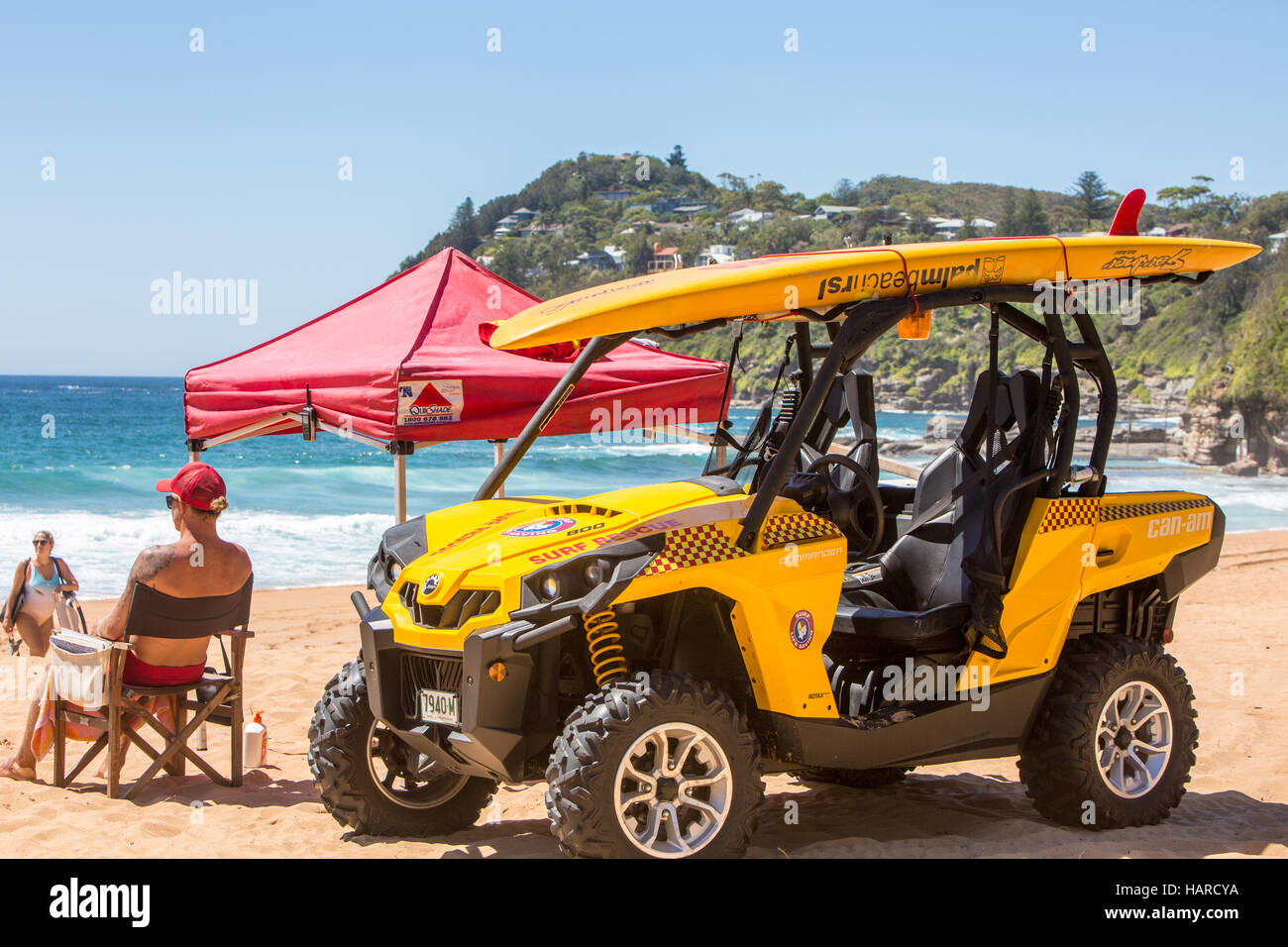 Surf rescue lifeguard seated on Whale Beach Sydney watching for those ...