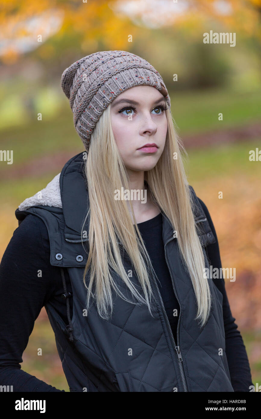 Portrait of a beautiful young woman outdoors during Autumn season Stock ...