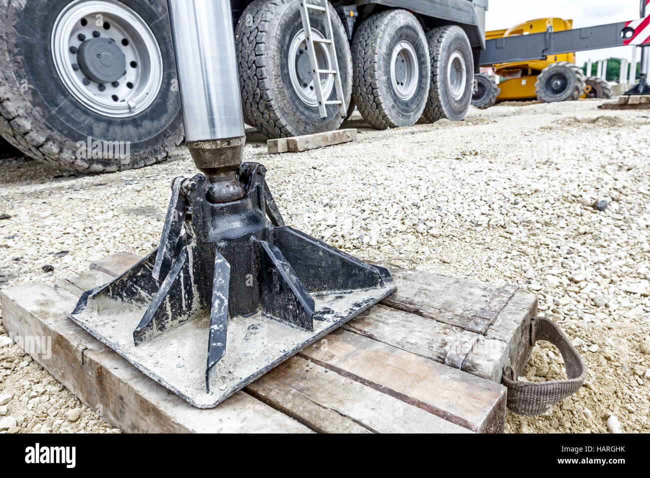 Extended side hydraulic outrigger to increase crane stability until is