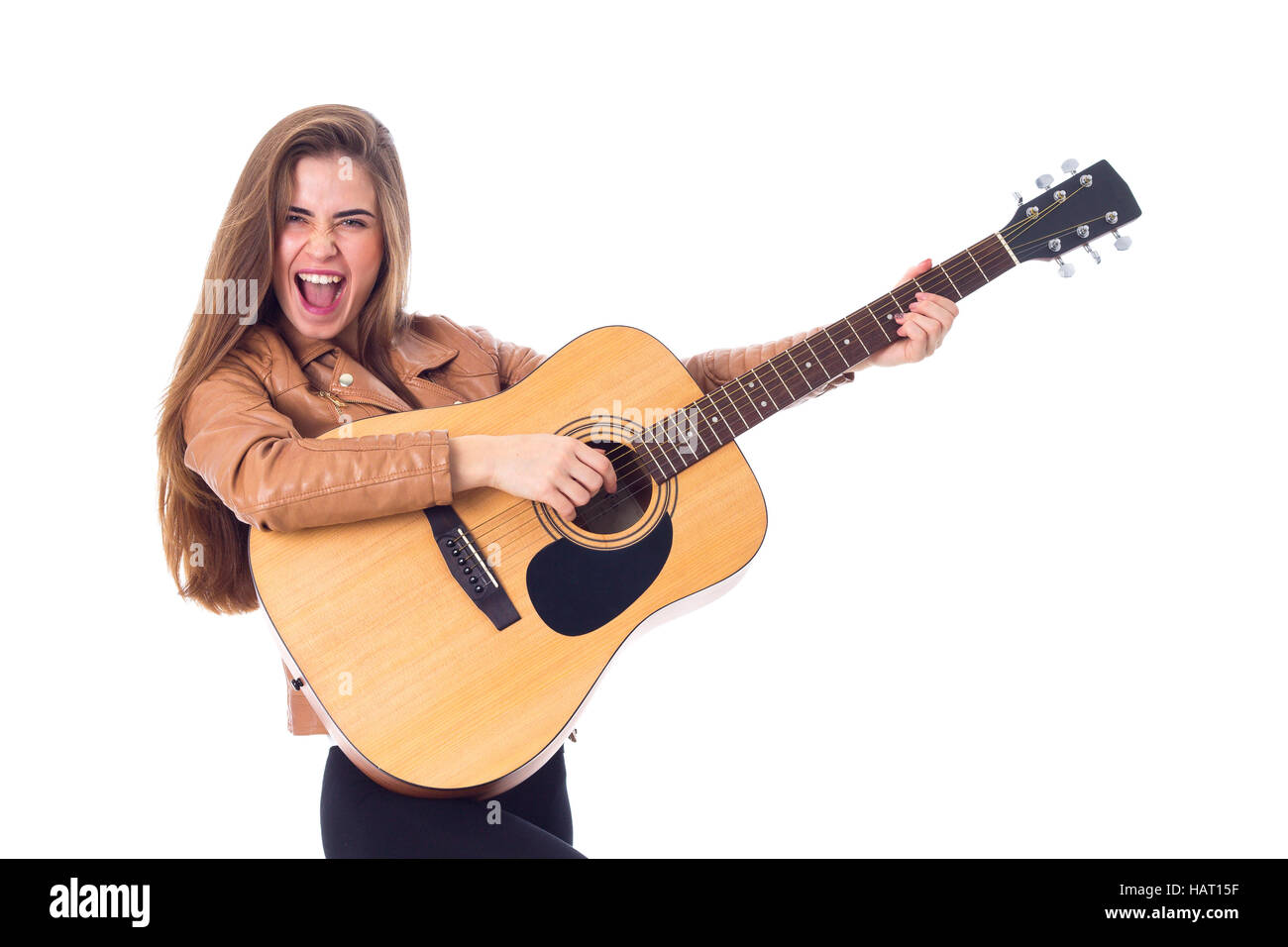 Young woman holding a guitar Stock Photo