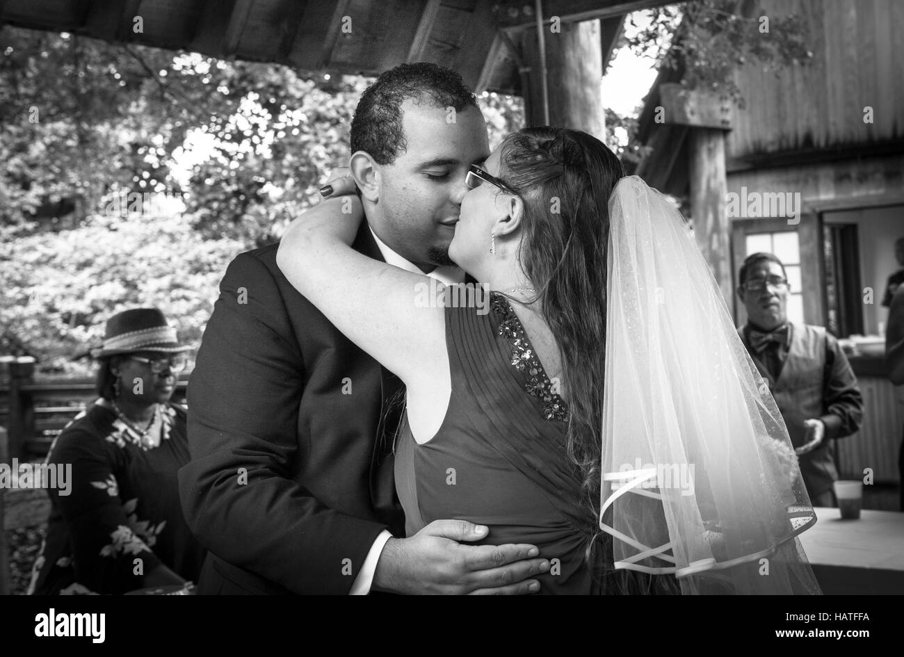 African American man and Caucasian woman getting married Stock Photo