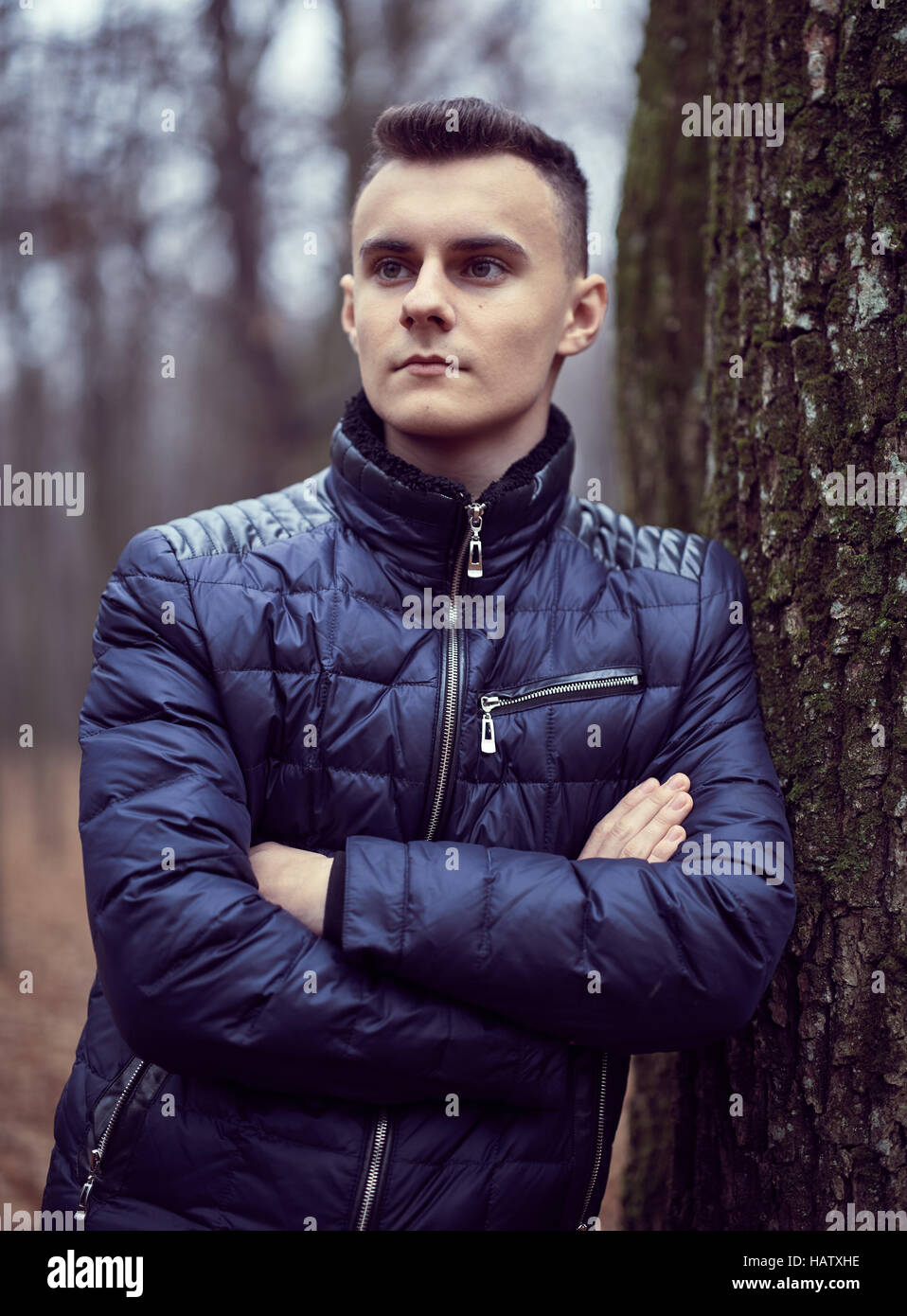 Trendy and handsome teenage boy in the park Stock Photo - Alamy