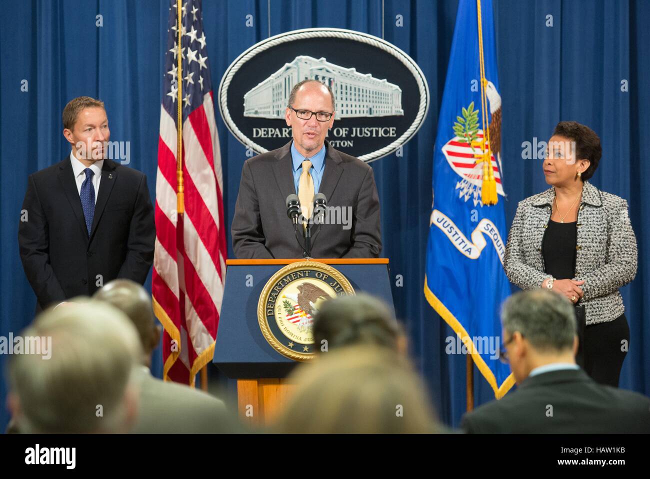 U.S. Department of Homeland Security Immigration and Customs Enforcement Deputy Director Daniel Ragsdale (left), Secretary of Labor Thomas Perez (middle), and Attorney General Loretta Lynch hold a press conference to discuss combating human trafficking at the Department of Justice June 25, 2015 in Washington, DC. Stock Photo