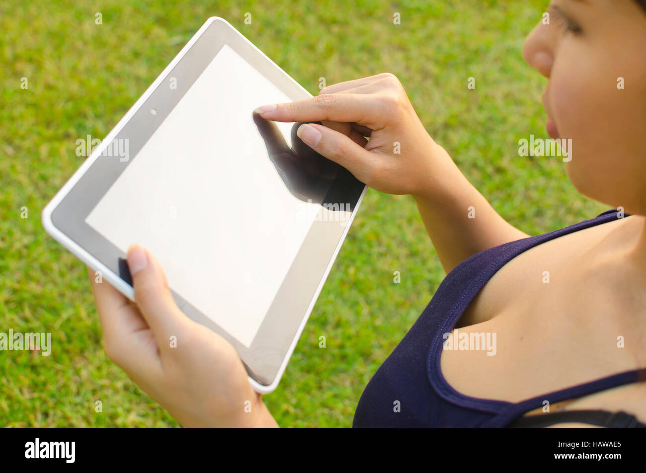 Green tablet technology girl hi-res stock photography and images - Alamy