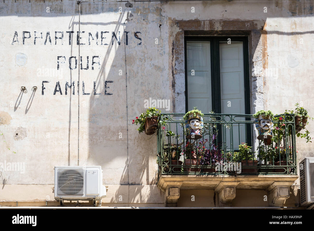 Apartment balconies in the coastal Sicilian town of Taormina Stock