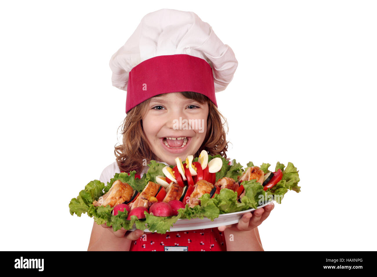 happy little girl cook with gourmet food Stock Photo