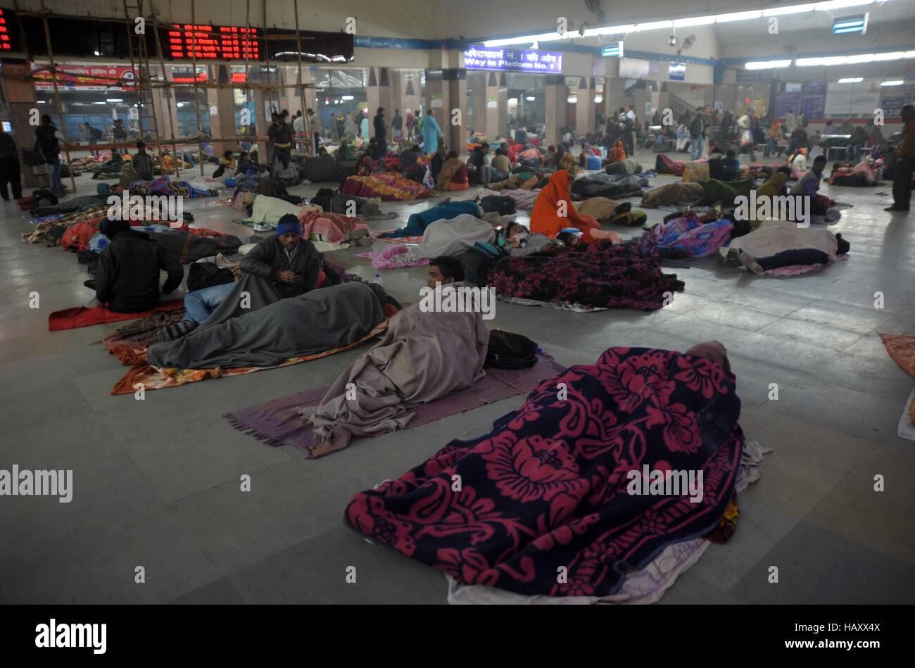 Allahabad, India. 03rd Dec, 2016. Passenger wrapped in warm cloth