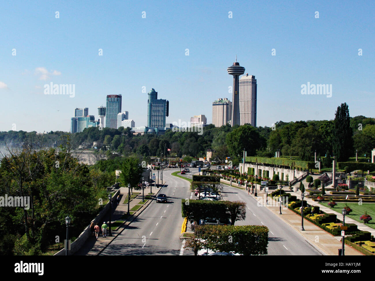 View of Skylon Tower and the Canadian side of Niagara Falls in Ontario, Canada from Rainbow Bridge Stock Photo