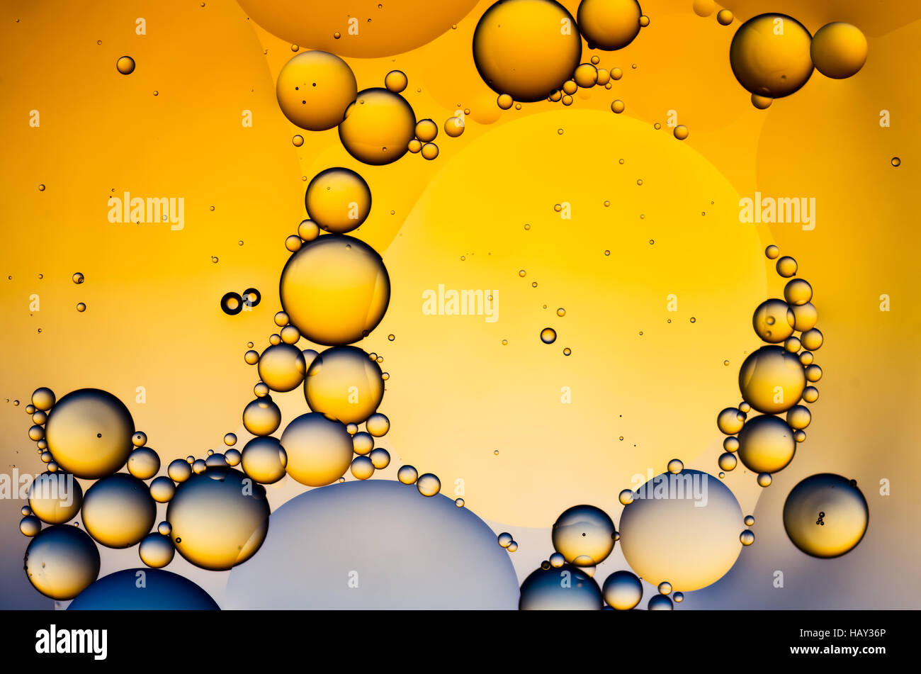 Complementary colors oil drops on water Stock Photo