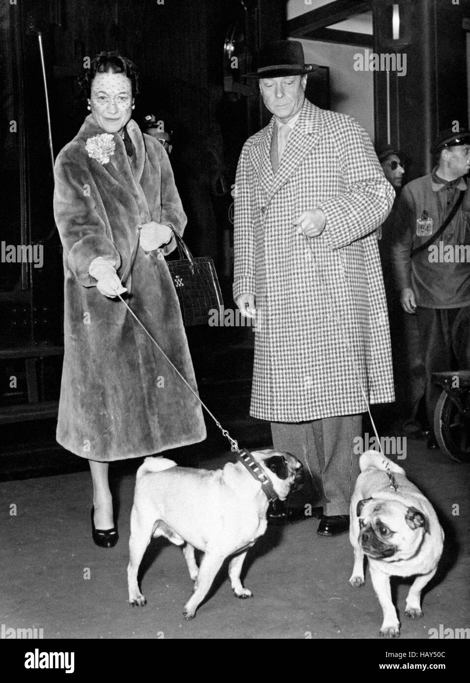 File photo dated 15/04/55 of King Edward VIII with his wife Wallis Simpson as they leave the train at the Gare St. Lazare, Paris, with their pet dogs, as historian Professor Richard Toye of Exeter University said that Edward VIII would have been a &quot;useless king&quot; had he stayed on the throne and his abdication saved the monarchy. Stock Photo