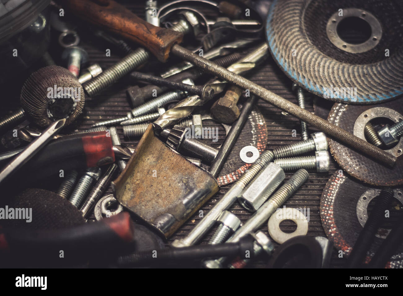 Auto mechanic metal parts and tools on a table Stock Photo Alamy