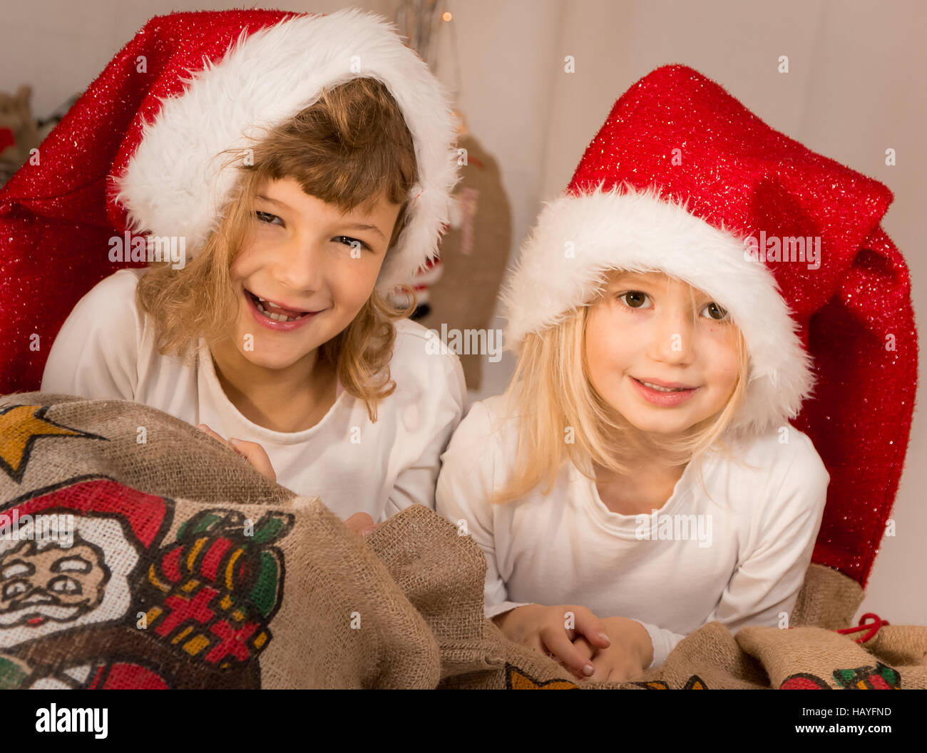 Two cute christmas elves Stock Photo