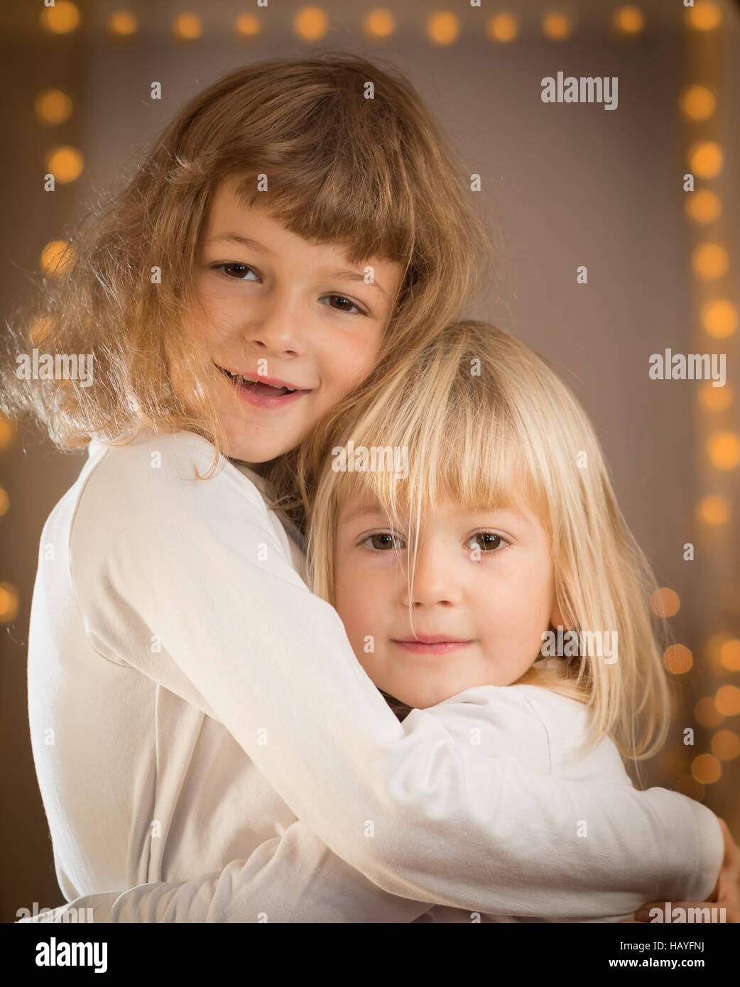 Two girls hugging each other Stock Photo