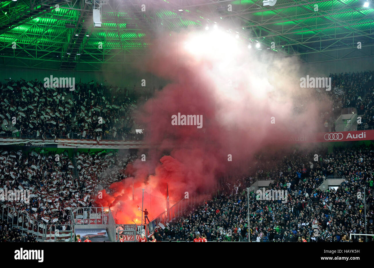 Borussia Park Mönchengladbach Germany 19.11.2016, 1st Football Bundesliga season 2016/17 matchday 11, Borussia Mönchengladbach (Moenchengladbach, Gladbach) vs 1.FC Köln (Koeln,Cologne) --- Cologne Fans burn pyrotechnics Stock Photo