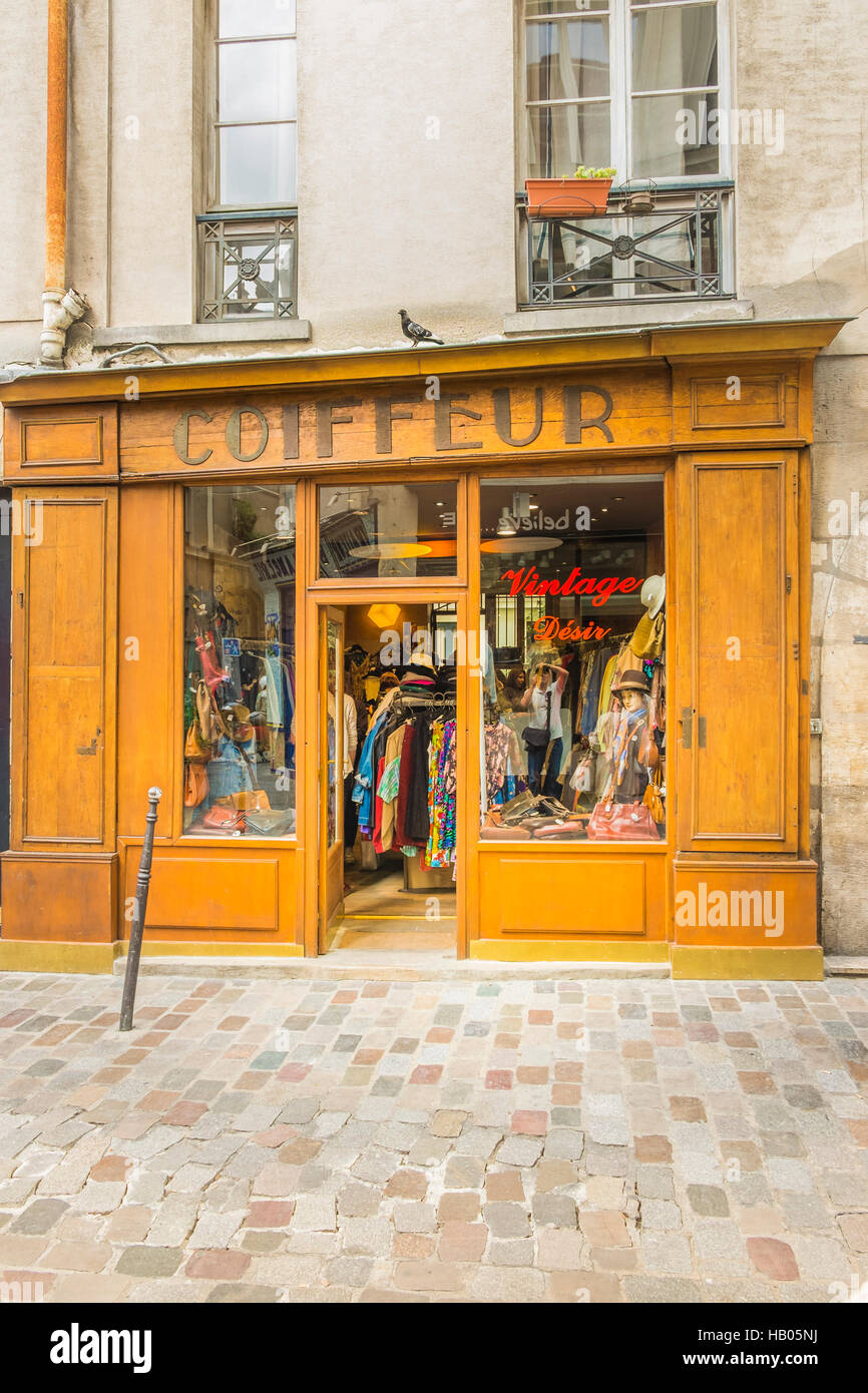 vintage désir, second hand clothes shop in the building of a former  barbershop, rue des rosiers, marais district Stock Photo - Alamy