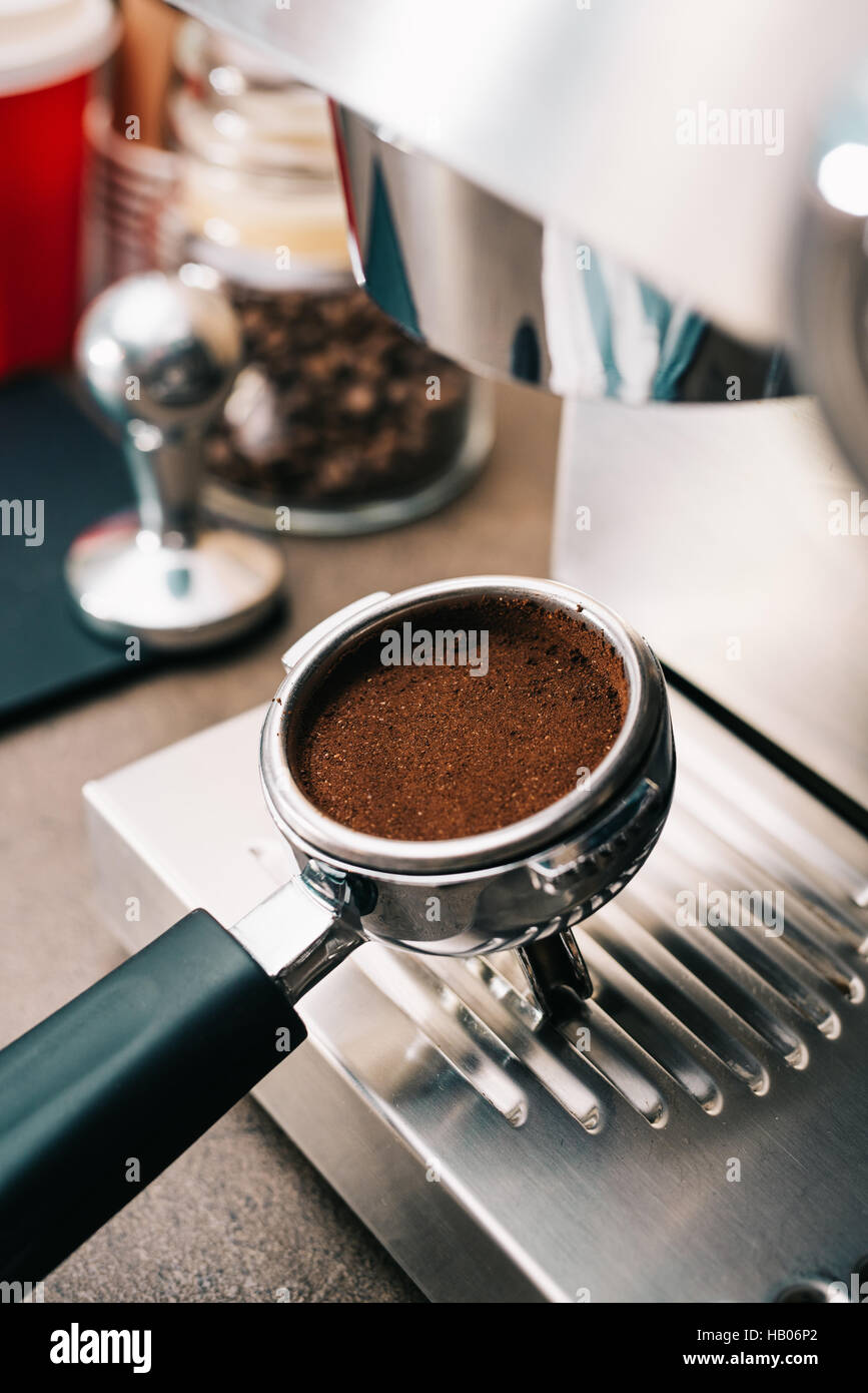 Freshly ground coffee in portafilter Stock Photo Alamy