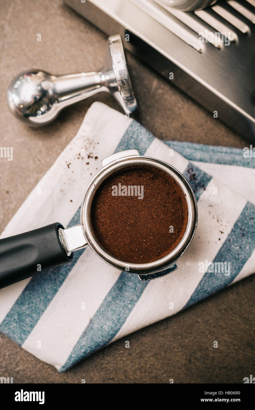 Freshly ground coffee in portafilter Stock Photo Alamy