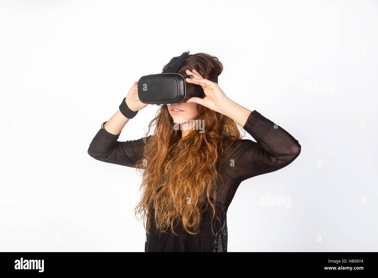 Happy beautiful girl virtual goggles VR 360 on isolated white Stock - Alamy