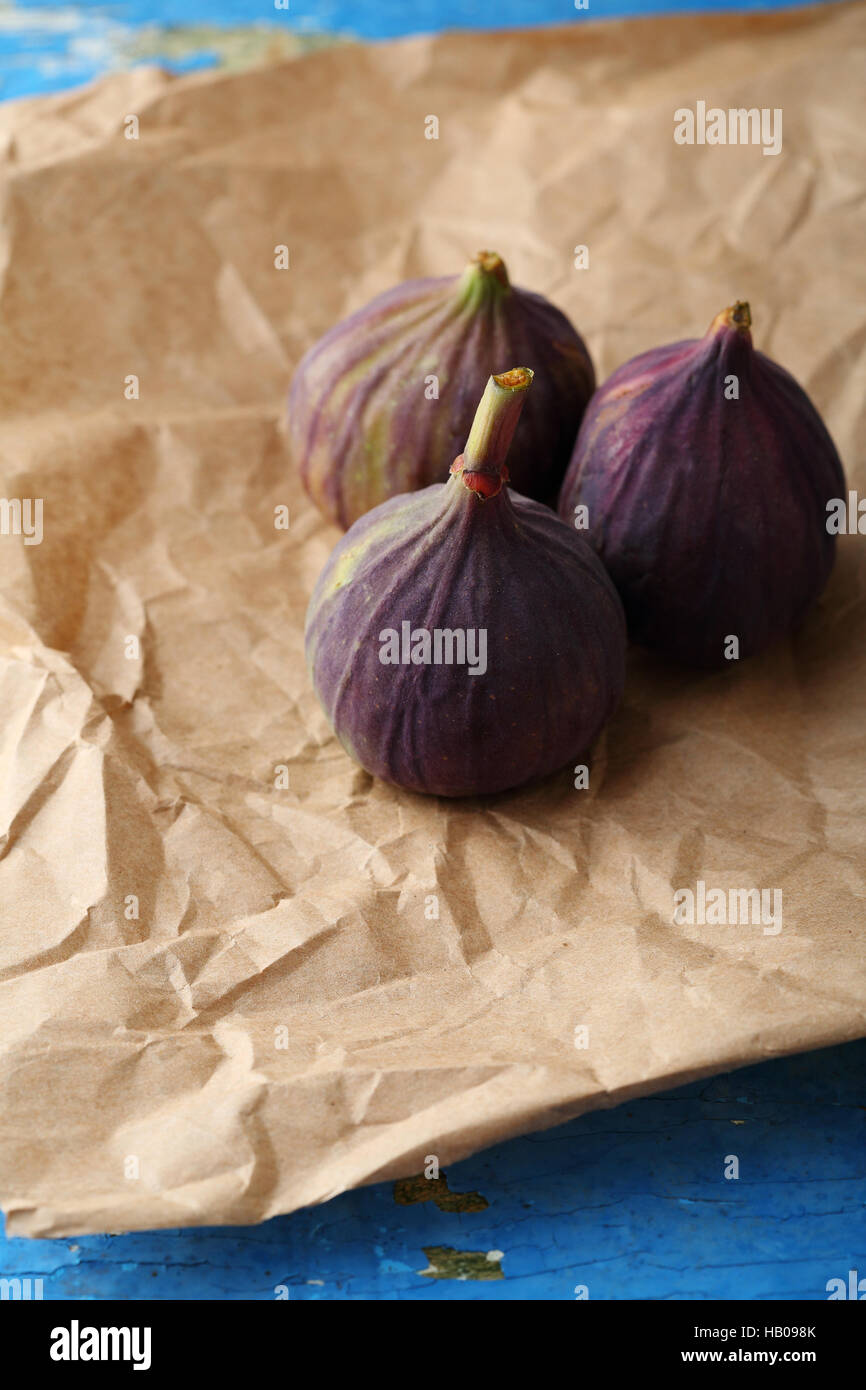 Three organic figs, fruits closeup Stock Photo