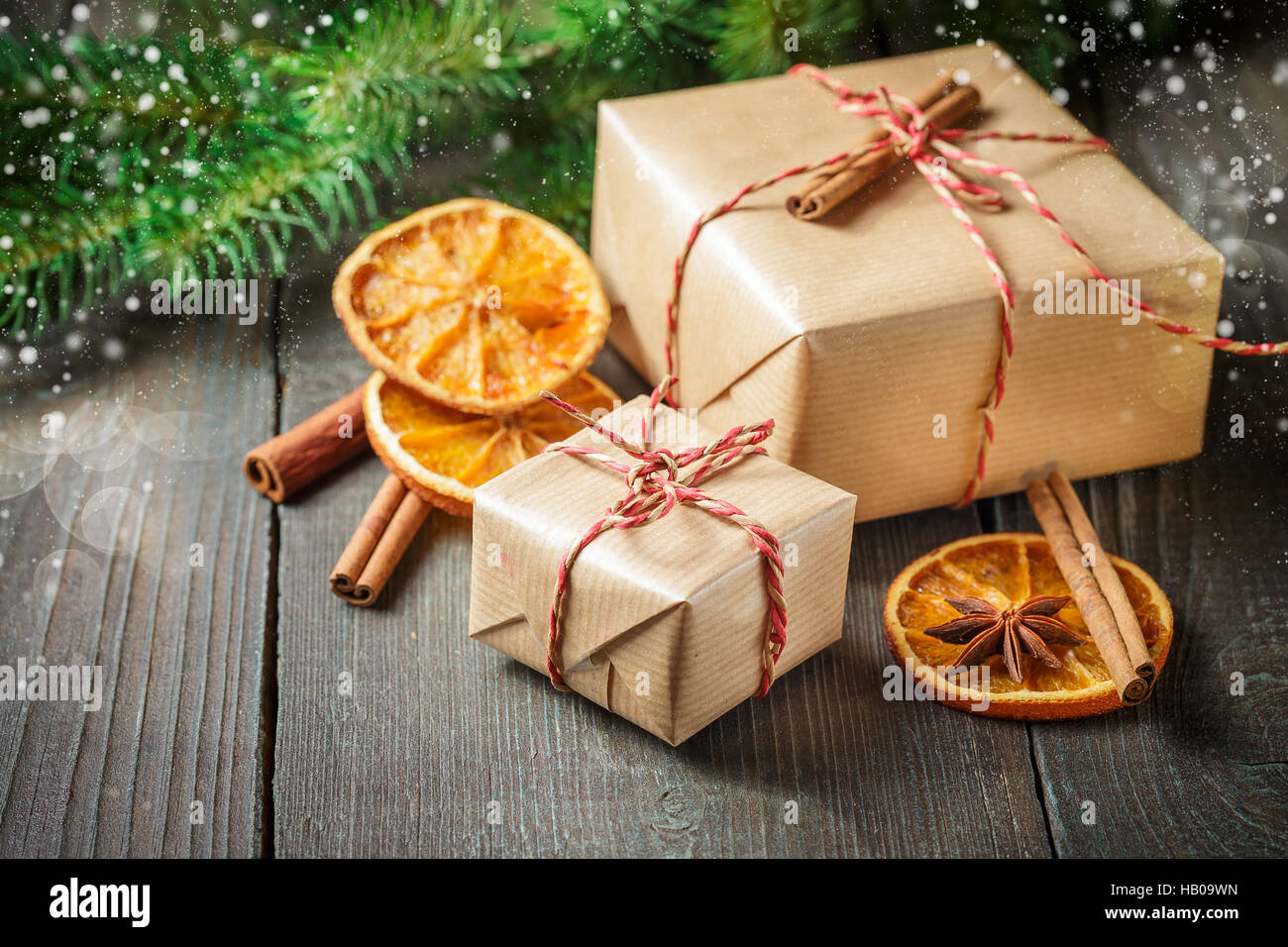 Christmas gifts, cinnamon, anise stars, dried orange slices and ...