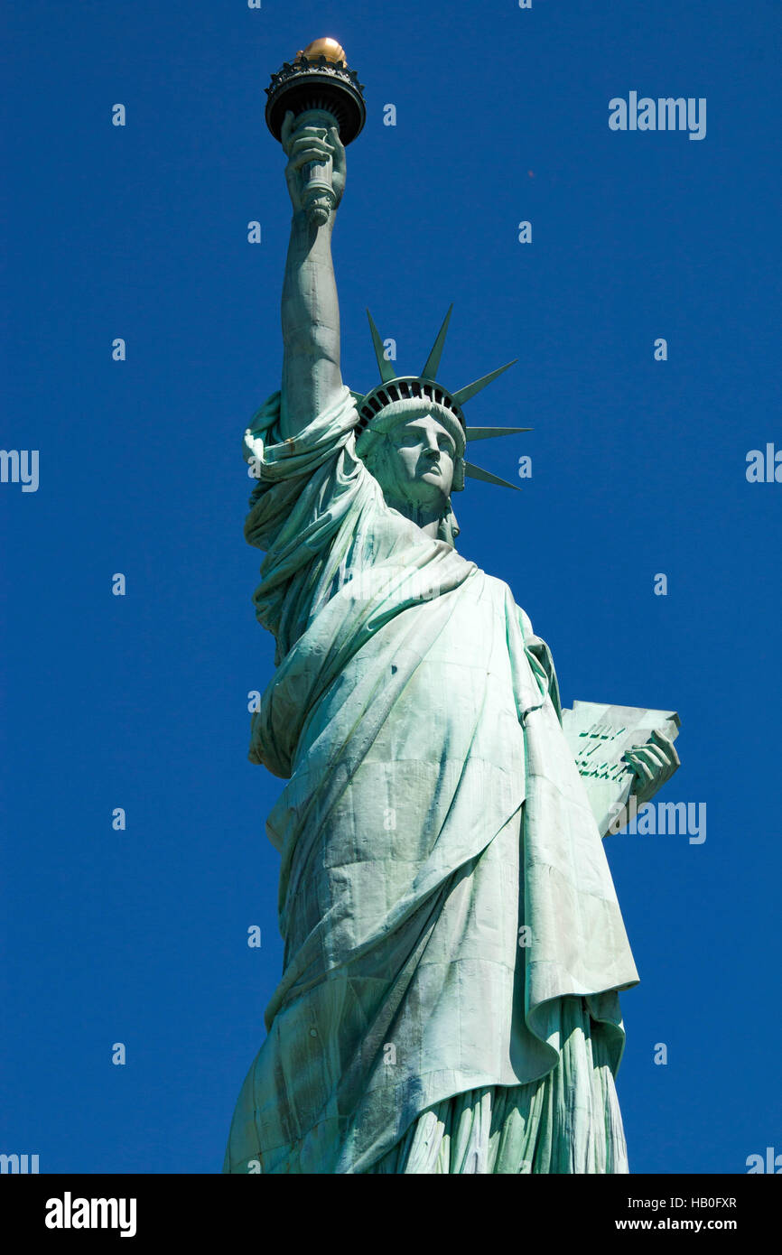 The Statue of Liberty is a colossal sculpture on Liberty Island in New
