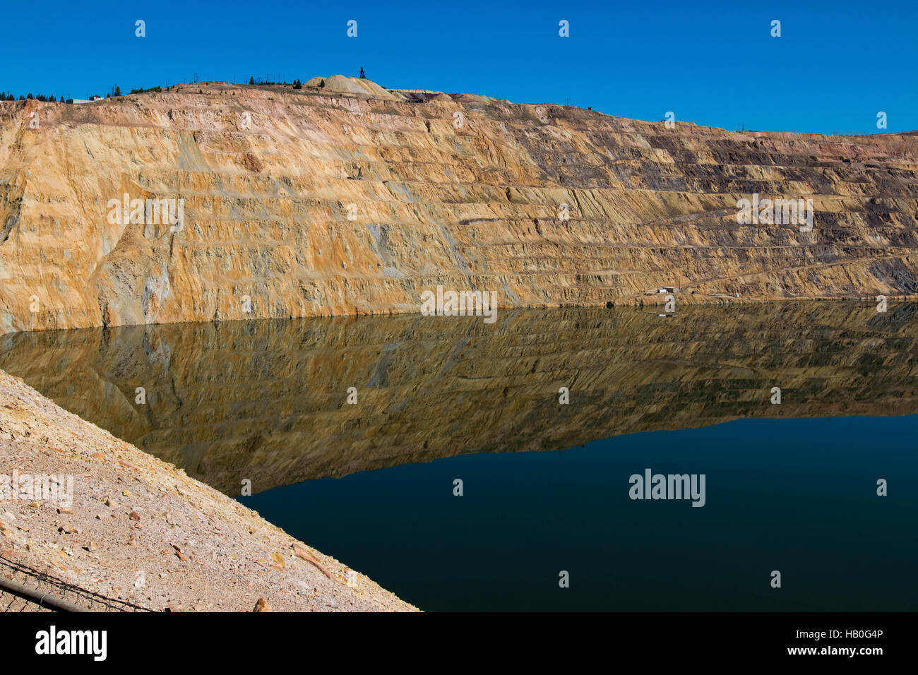 The Berkeley Pit is a former open pit copper mine located in Butte, Montana, United States. Stock Photo