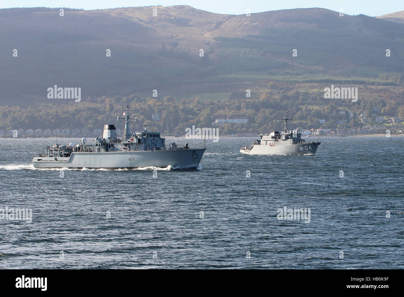 HMS Hurworth (M39) of the Royal Navy, and LVNS Imanta (M-04) of the Latvian Navy, arriving for Exercise Joint Warrior 16-2. Stock Photo
