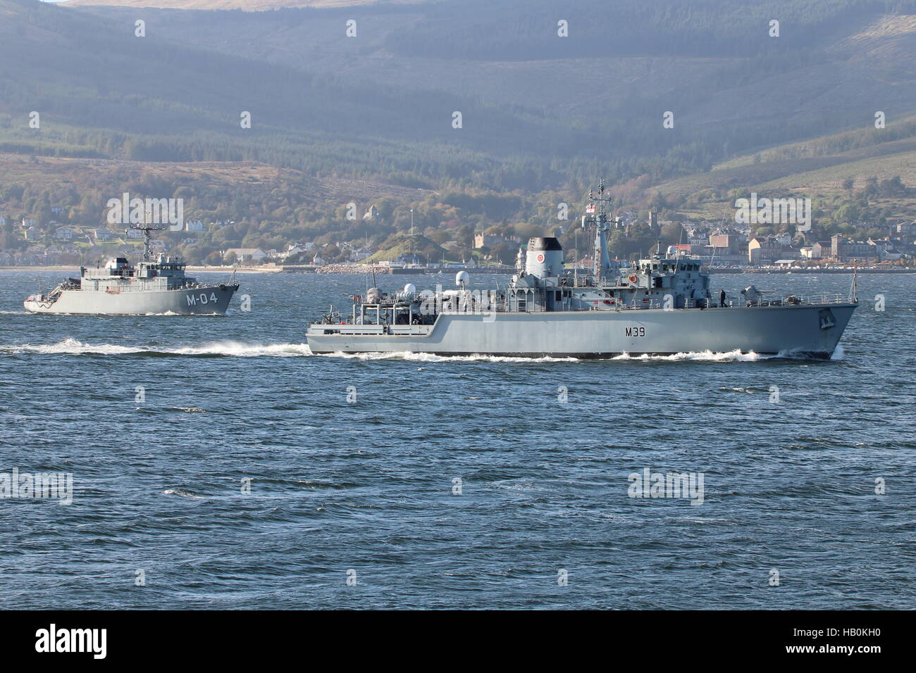 HMS Hurworth (M39) of the Royal Navy, and LVNS Imanta (M-04) of the Latvian Navy, arriving for Exercise Joint Warrior 16-2. Stock Photo